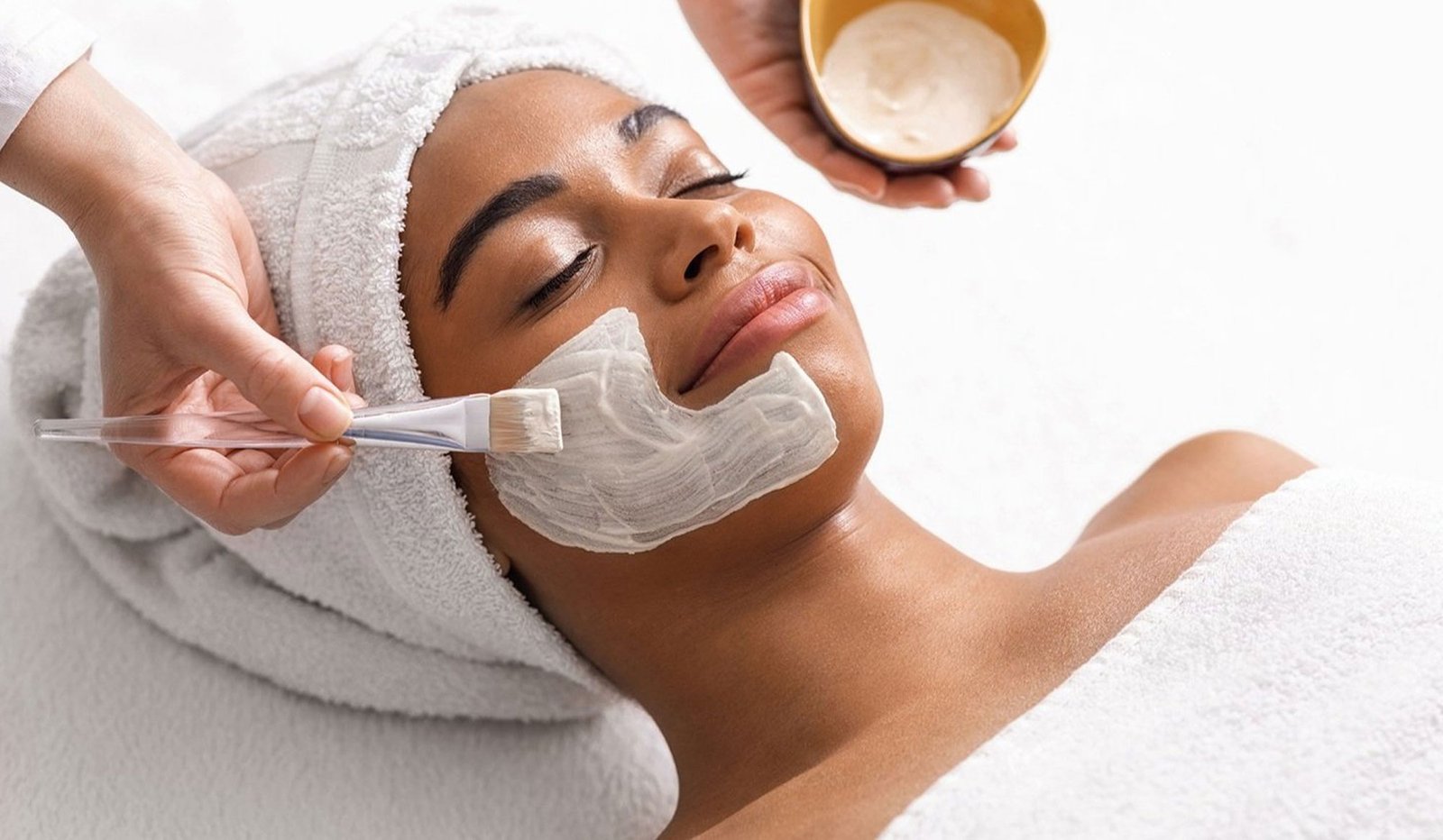 A facial mask being applied as part of skin care